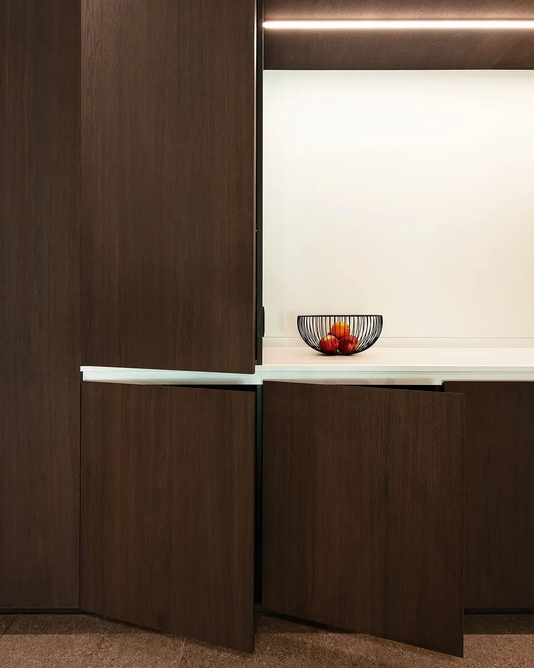 Office kitchen featuring RealGrain Knokke brunette timber-look panels.